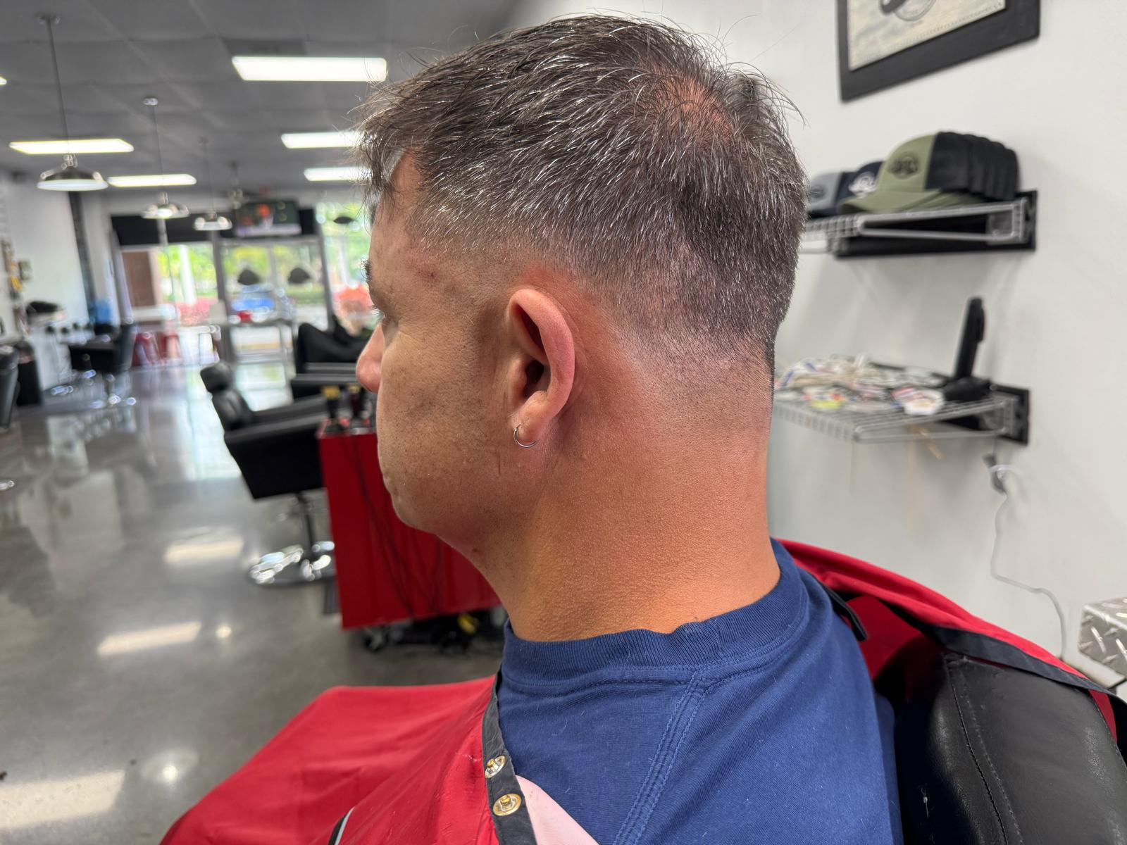 Classic men’s haircut with a clean taper